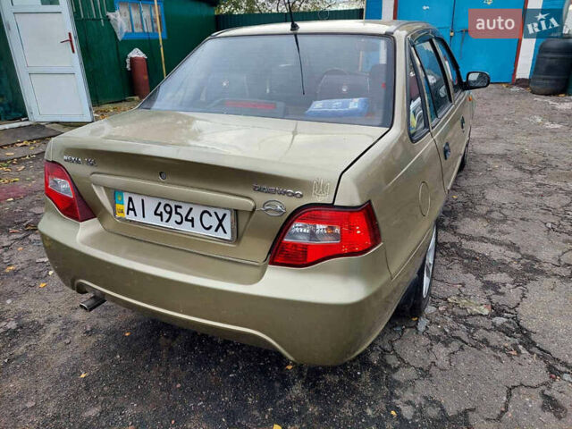 Жовтий Деу Нексія, об'ємом двигуна 1.6 л та пробігом 60 тис. км за 3350 $, фото 4 на Automoto.ua