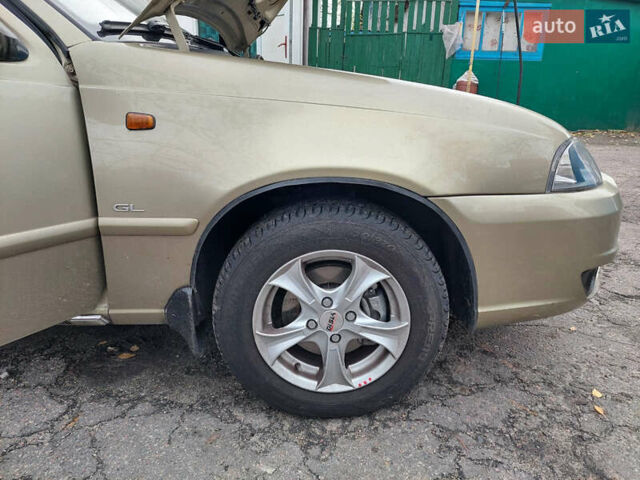 Жовтий Деу Нексія, об'ємом двигуна 1.6 л та пробігом 60 тис. км за 3350 $, фото 10 на Automoto.ua