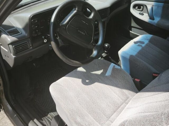 Сірий Деу Нексія, об'ємом двигуна 1.5 л та пробігом 268 тис. км за 1400 $, фото 5 на Automoto.ua