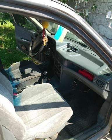 Сірий Деу Нексія, об'ємом двигуна 1.5 л та пробігом 200 тис. км за 1000 $, фото 2 на Automoto.ua