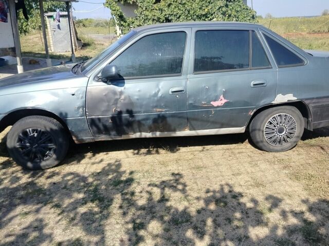 Сірий Деу Нексія, об'ємом двигуна 1.5 л та пробігом 111 тис. км за 607 $, фото 2 на Automoto.ua