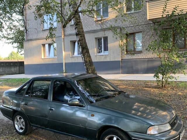 Серый Дэу Нексия, объемом двигателя 1.5 л и пробегом 240 тыс. км за 750 $, фото 1 на Automoto.ua