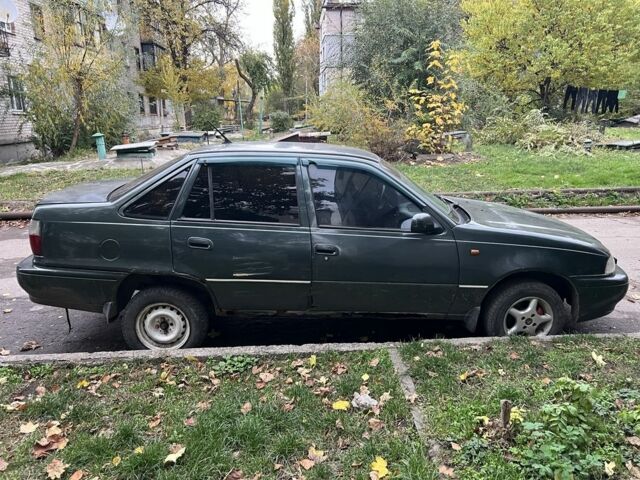 Деу Нексія 1997 у Кам'янське (Дніпродзержинськ) на Automoto.ua Сірий Деу Нексія, об'ємом двигуна 1.5 л та пробігом 400 тис. км за 1000 $, фото 4 на Automoto.ua