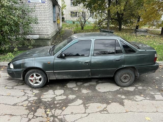 Деу Нексія 1997 у Кам'янське (Дніпродзержинськ) на Automoto.ua Сірий Деу Нексія, об'ємом двигуна 1.5 л та пробігом 400 тис. км за 1000 $, фото 2 на Automoto.ua