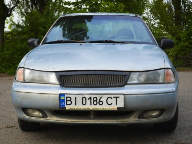 Серый Дэу Нексия, объемом двигателя 1.5 л и пробегом 349 тыс. км за 27500 $, фото 4 на Automoto.ua