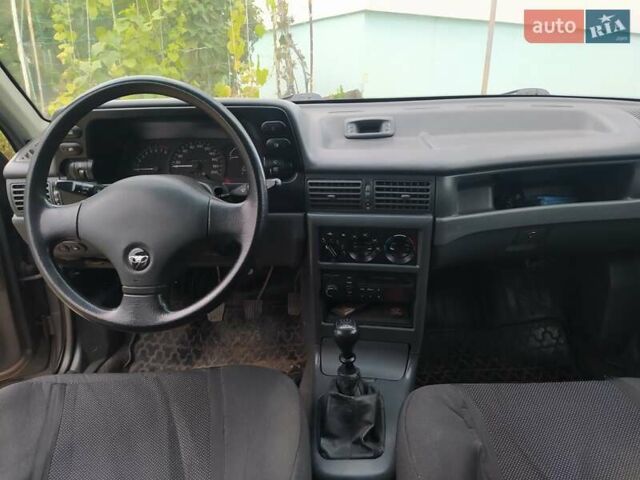 Сірий Деу Нексія, об'ємом двигуна 1.5 л та пробігом 120 тис. км за 4126 $, фото 11 на Automoto.ua
