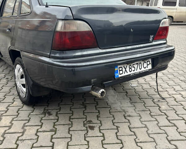 Серый Дэу Нексия, объемом двигателя 1.5 л и пробегом 259 тыс. км за 1300 $, фото 3 на Automoto.ua