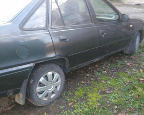 Сірий Деу Нексія, об'ємом двигуна 1.5 л та пробігом 280 тис. км за 1900 $, фото 1 на Automoto.ua