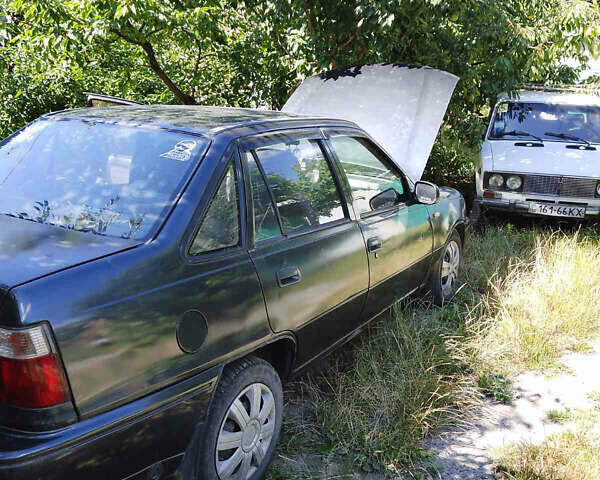 Сірий Деу Нексія, об'ємом двигуна 1.5 л та пробігом 280 тис. км за 1900 $, фото 3 на Automoto.ua