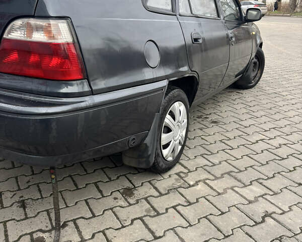 Серый Дэу Нексия, объемом двигателя 1.5 л и пробегом 259 тыс. км за 1300 $, фото 4 на Automoto.ua