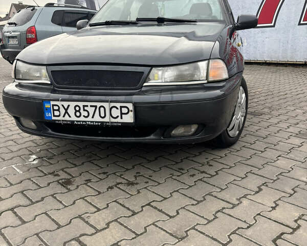 Сірий Деу Нексія, об'ємом двигуна 1.5 л та пробігом 285 тис. км за 1600 $, фото 1 на Automoto.ua