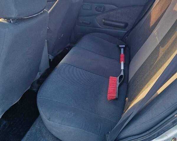 Серый Дэу Нексия, объемом двигателя 1.5 л и пробегом 147 тыс. км за 2600 $, фото 4 на Automoto.ua