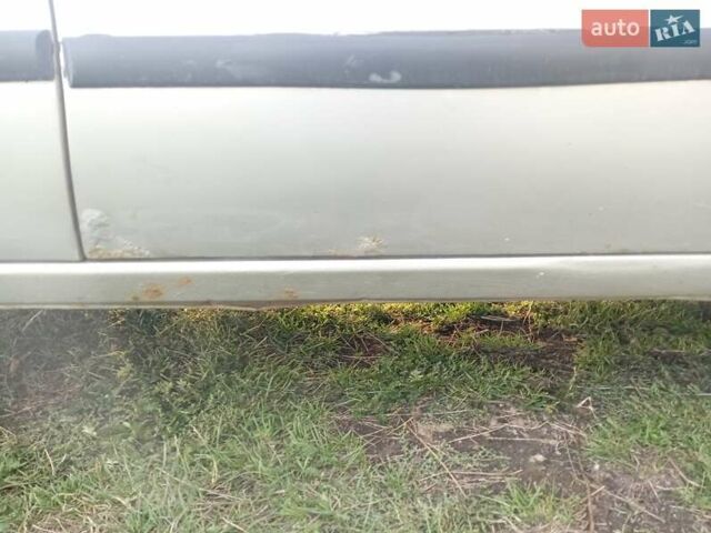 Сірий Деу Нексія, об'ємом двигуна 1.5 л та пробігом 208 тис. км за 1640 $, фото 6 на Automoto.ua