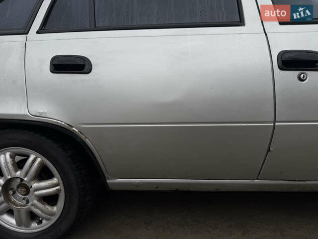 Серый Дэу Нексия, объемом двигателя 1.5 л и пробегом 250 тыс. км за 1200 $, фото 2 на Automoto.ua