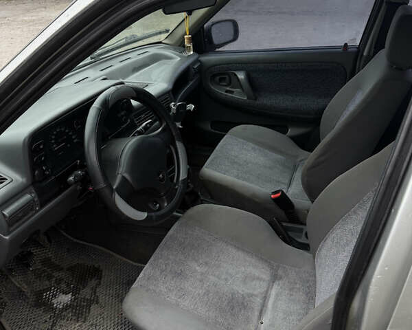 Серый Дэу Нексия, объемом двигателя 1.5 л и пробегом 250 тыс. км за 1200 $, фото 14 на Automoto.ua