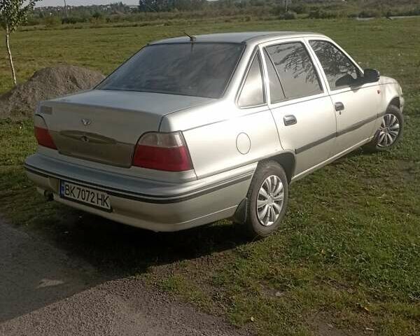 Сірий Деу Нексія, об'ємом двигуна 1.5 л та пробігом 208 тис. км за 1640 $, фото 1 на Automoto.ua