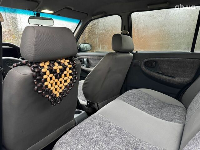 Сірий Деу Нексія, об'ємом двигуна 1.5 л та пробігом 159 тис. км за 2190 $, фото 19 на Automoto.ua