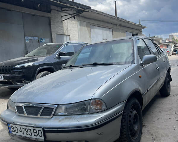 Серый Дэу Нексия, объемом двигателя 1.6 л и пробегом 295 тыс. км за 450 $, фото 2 на Automoto.ua