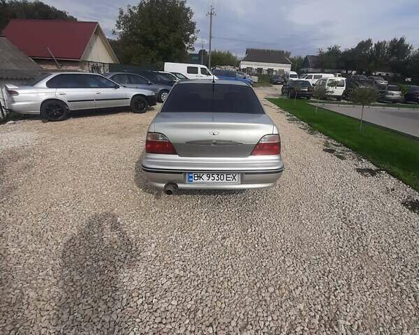 Сірий Деу Нексія, об'ємом двигуна 1.5 л та пробігом 250 тис. км за 1190 $, фото 4 на Automoto.ua