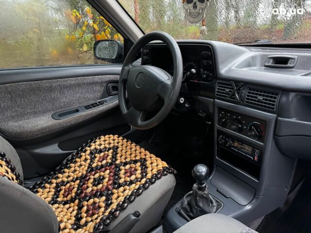 Сірий Деу Нексія, об'ємом двигуна 1.5 л та пробігом 159 тис. км за 2190 $, фото 25 на Automoto.ua