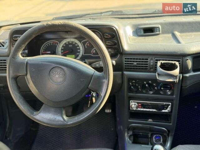 Серый Дэу Нексия, объемом двигателя 1.5 л и пробегом 300 тыс. км за 1010 $, фото 7 на Automoto.ua