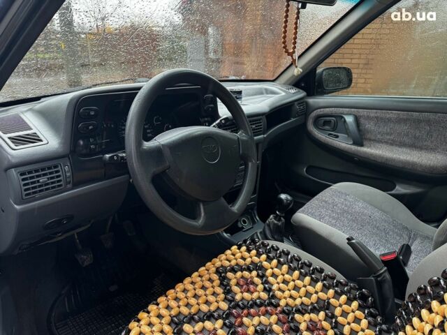 Сірий Деу Нексія, об'ємом двигуна 1.5 л та пробігом 159 тис. км за 2190 $, фото 10 на Automoto.ua