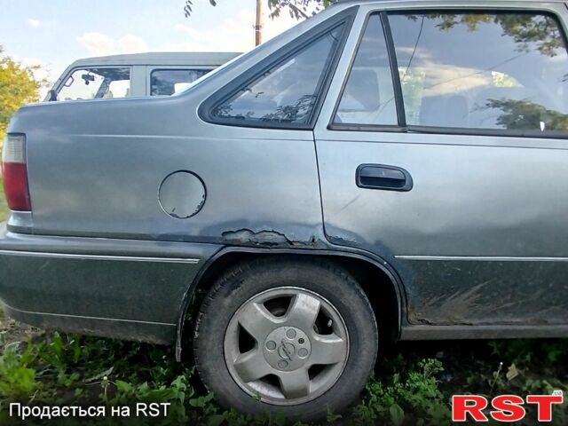 Серый Дэу Нексия, объемом двигателя 1.5 л и пробегом 222 тыс. км за 1200 $, фото 7 на Automoto.ua