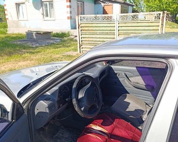 Серый Дэу Нексия, объемом двигателя 1.6 л и пробегом 174 тыс. км за 1500 $, фото 3 на Automoto.ua