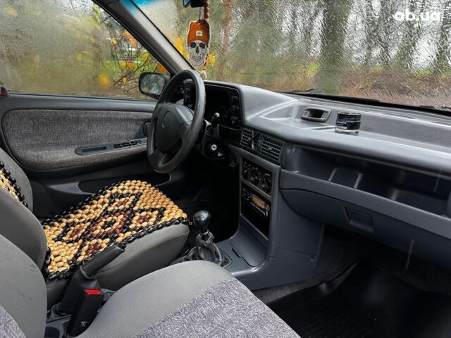 Сірий Деу Нексія, об'ємом двигуна 1.5 л та пробігом 159 тис. км за 2190 $, фото 24 на Automoto.ua