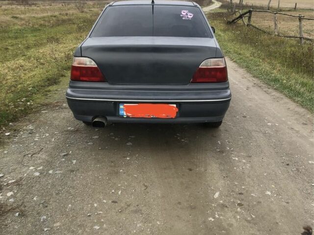 Сірий Деу Нексія, об'ємом двигуна 1.5 л та пробігом 30 тис. км за 1400 $, фото 1 на Automoto.ua