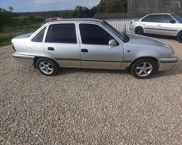 Сірий Деу Нексія, об'ємом двигуна 1.5 л та пробігом 250 тис. км за 1190 $, фото 3 на Automoto.ua