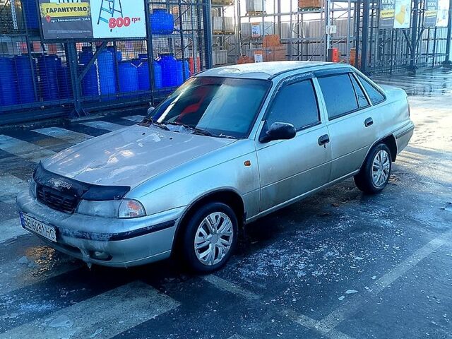 Серый Дэу Нексия, объемом двигателя 1.6 л и пробегом 268 тыс. км за 1800 $, фото 1 на Automoto.ua
