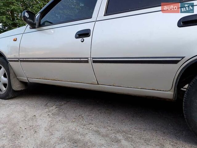 Сірий Деу Нексія, об'ємом двигуна 1.5 л та пробігом 330 тис. км за 1350 $, фото 5 на Automoto.ua
