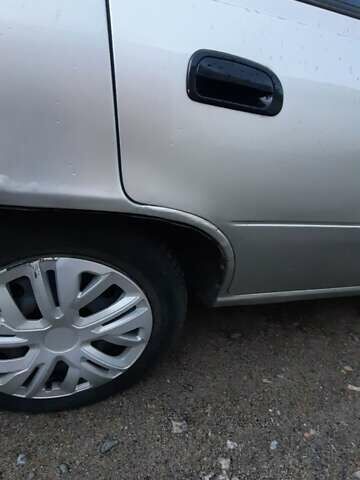 Сірий Деу Нексія, об'ємом двигуна 1.5 л та пробігом 150 тис. км за 1550 $, фото 2 на Automoto.ua