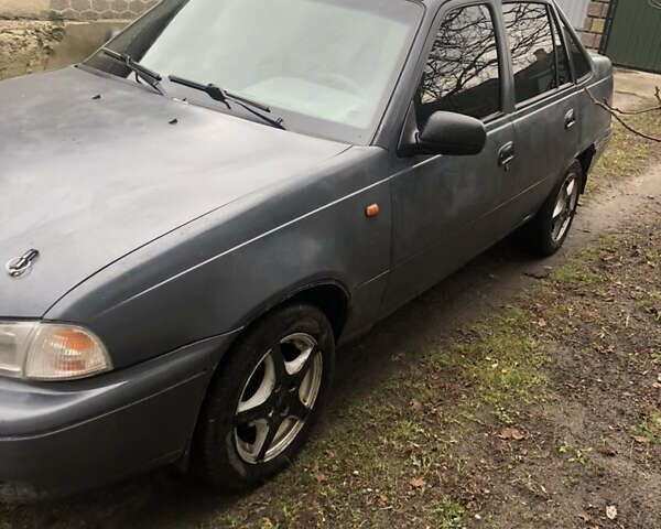 Серый Дэу Нексия, объемом двигателя 1.5 л и пробегом 30 тыс. км за 1400 $, фото 2 на Automoto.ua