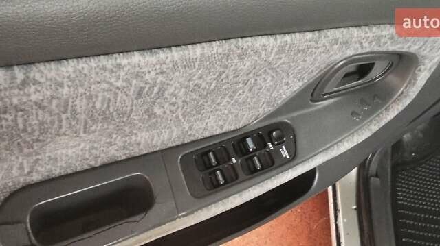 Сірий Деу Нексія, об'ємом двигуна 1.5 л та пробігом 95 тис. км за 1650 $, фото 18 на Automoto.ua