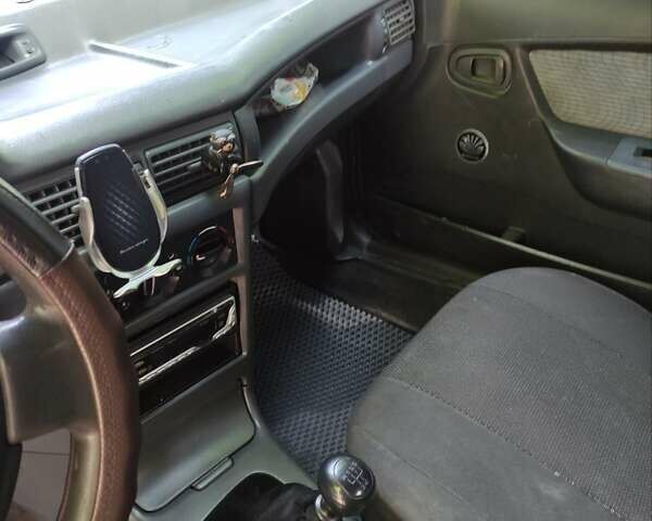 Сірий Деу Нексія, об'ємом двигуна 1.5 л та пробігом 250 тис. км за 1600 $, фото 4 на Automoto.ua