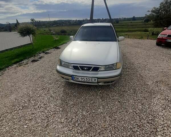 Сірий Деу Нексія, об'ємом двигуна 1.5 л та пробігом 250 тис. км за 1190 $, фото 2 на Automoto.ua