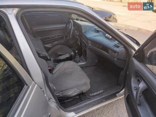 Сірий Деу Нексія, об'ємом двигуна 1.5 л та пробігом 300 тис. км за 629 $, фото 5 на Automoto.ua