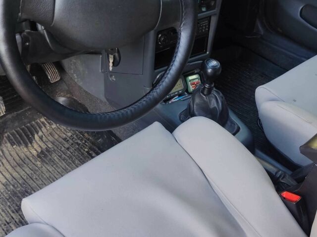 Серый Дэу Нексия, объемом двигателя 1.5 л и пробегом 210 тыс. км за 2000 $, фото 8 на Automoto.ua