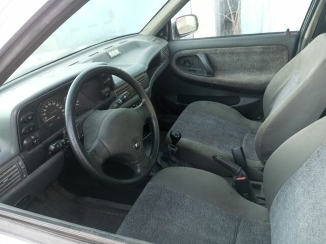 Сірий Деу Нексія, об'ємом двигуна 1.5 л та пробігом 3 тис. км за 1413 $, фото 3 на Automoto.ua