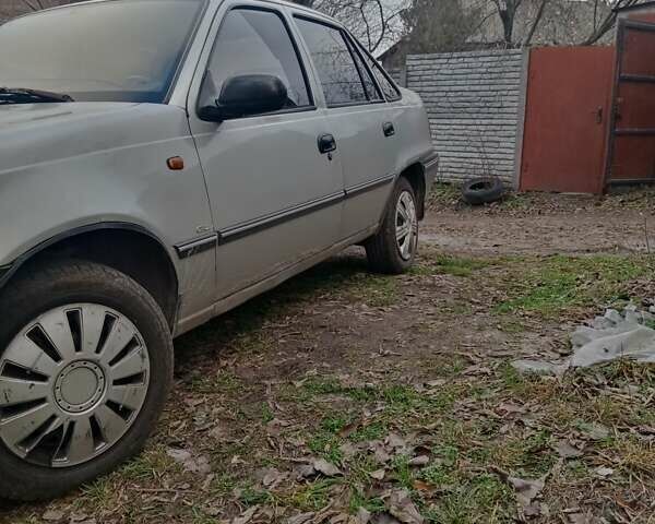 Серый Дэу Нексия, объемом двигателя 1.5 л и пробегом 257 тыс. км за 1650 $, фото 1 на Automoto.ua