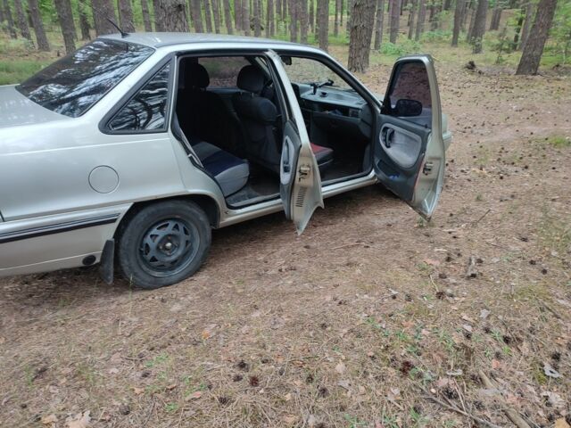 Сірий Деу Нексія, об'ємом двигуна 1.5 л та пробігом 245 тис. км за 1549 $, фото 10 на Automoto.ua