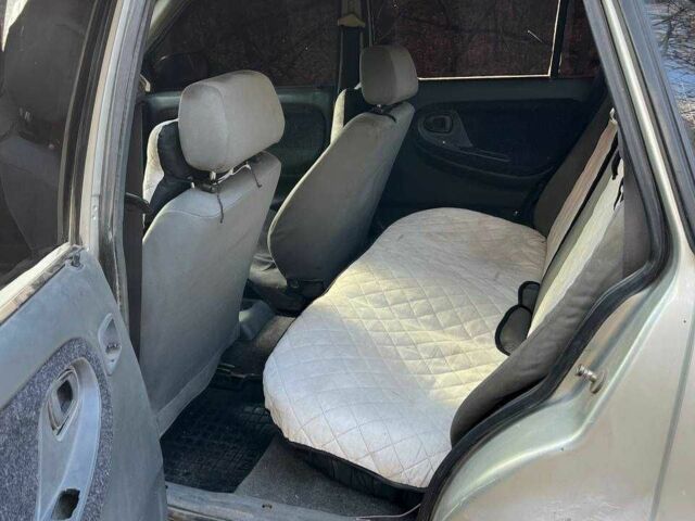 Серый Дэу Нексия, объемом двигателя 10 л и пробегом 200 тыс. км за 1199 $, фото 3 на Automoto.ua