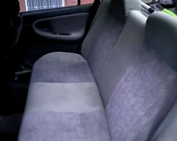 Серый Дэу Нексия, объемом двигателя 1.6 л и пробегом 208 тыс. км за 1200 $, фото 4 на Automoto.ua