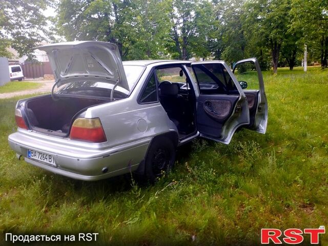 Сірий Деу Нексія, об'ємом двигуна 1.5 л та пробігом 231 тис. км за 1500 $, фото 12 на Automoto.ua