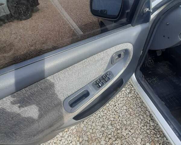 Сірий Деу Нексія, об'ємом двигуна 1.5 л та пробігом 250 тис. км за 1190 $, фото 9 на Automoto.ua