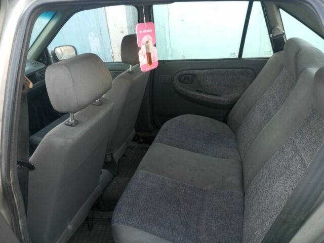 Сірий Деу Нексія, об'ємом двигуна 1.5 л та пробігом 3 тис. км за 1413 $, фото 4 на Automoto.ua