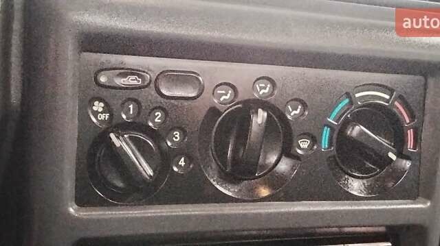 Сірий Деу Нексія, об'ємом двигуна 1.5 л та пробігом 95 тис. км за 1650 $, фото 11 на Automoto.ua