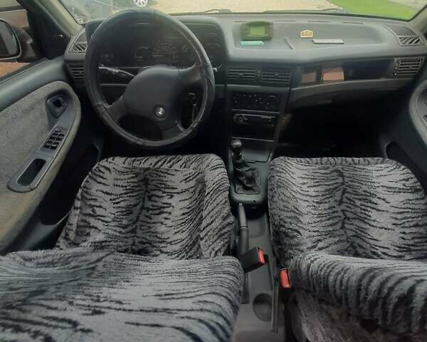 Сірий Деу Нексія, об'ємом двигуна 1.5 л та пробігом 250 тис. км за 1299 $, фото 10 на Automoto.ua
